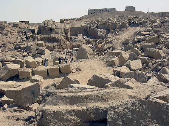 Modern quarrying in the ancient granite quarries at Aswan. Note ancient object in the foreground