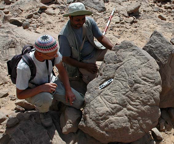 With egyptologist Adel kelany at newly discovered Late Palaeolithic rock art in Wadi Abu Subeira, Upper Egypt. Photo by Dirk Huyge