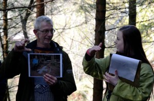 Torbjørn Løland and his pupil explaining us a quarry for early stone crosses - and millstone