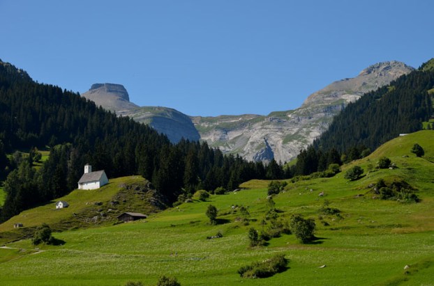 A view to the little medieval church called Sogn Sievi (St. Eusebius), situated by a former castle on top of a small hill at Brigels. Photo: Per Storemyr