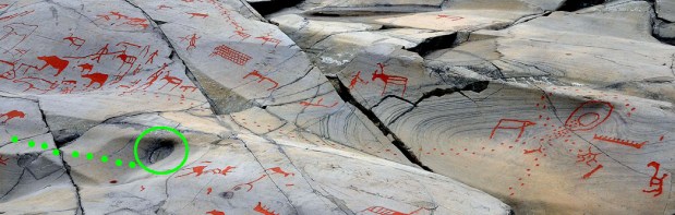 Bear hunting scene at the panel Bergbukten I: The bear has gone out from the circular feature to the right and is hunted at the left. Enhanced in green: A natural rock feature forming a bear den, from which tracks appear. Photo: Per Storemyr.