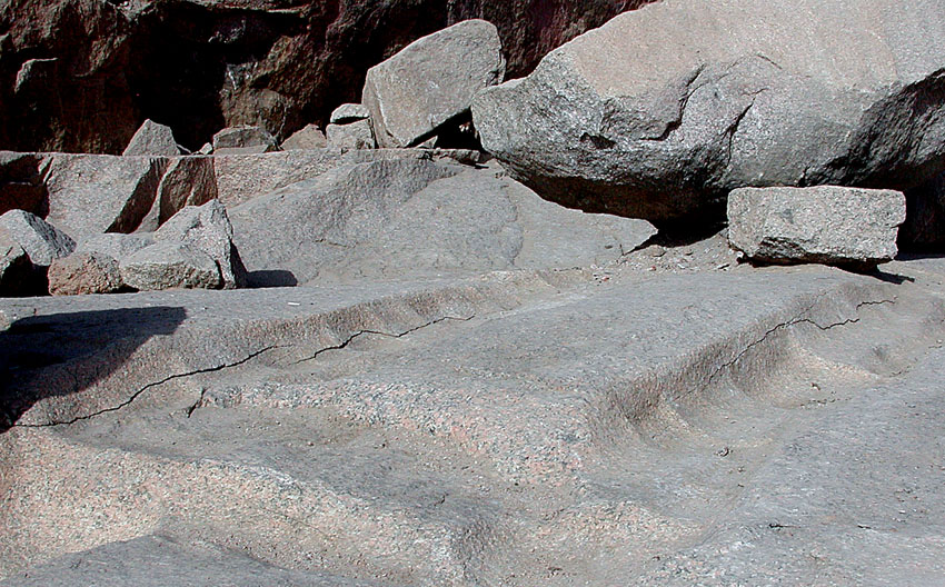 Old cracks in the granite at the Unfinished Obelisk quarry at Aswan. Such cracks were very probably induced by fire in the New Kingdom to ease the extraction of granite. Photo: Per Storemyr