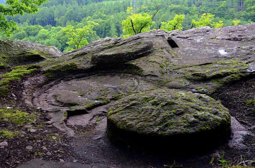 Switzerland: The millstone quarries in Mels (Canton St. Gallen), showing how rough outs were carved from the gritstone bedrock. This is a quarry with a history all the way back to the Roman period. Photo: Per Storemyr