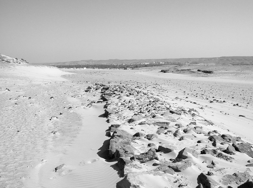 The paved New Kingdom road along the northern margin of Wadi el-Deir towards the Nile by Naq el-Gulab. This road connects with causeways descending from Gebel Gulab. Photo: Per Storemyr