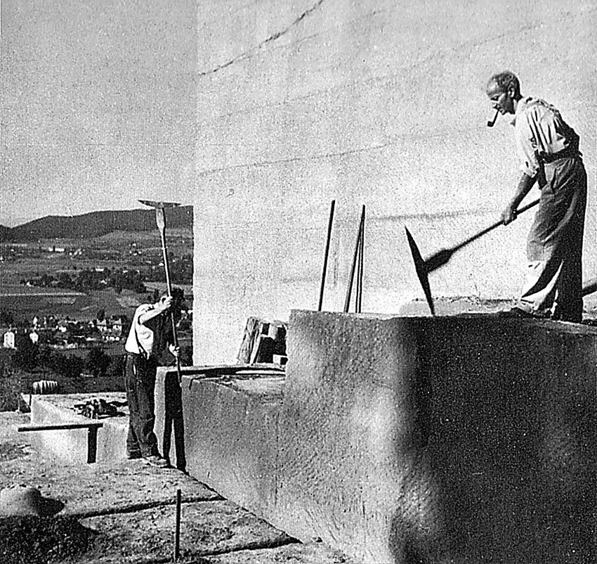 Making separation trenches on a broad platform with heavy, double picks (the German Schrotpickel) in the large Ostermundigen sandstone quarry near Berne (Switzerland) in 1951. Photo by W. NYDEGGER as reproduced in SCHMALZ (1983, 30) along with several other very illustrative images of traditional extraction techniques that were in full use in the modern era at Ostermundigen well after more modern quarrying techniques became available.