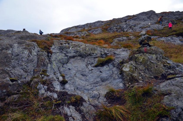 A shallow hole in the rock. Traces of firesetting at the Siggjo Neolithic rhyolitie quarries. Photo by Per Storemyr