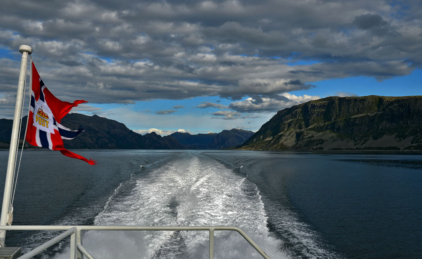 There is at least one great thing about living in Western Norway: The coastal express boat! It is the best way of travelling from one job to another. I have made numerous trips up and down the magnificent coastline, here at Frøysjøen between Florø and Måløy - with Devonian sandstones and conglomerates in the background, and very close to the grand rock art site at Vingen. Photo by Per Storemyr