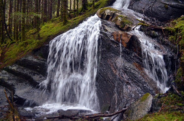 A medieval millstone quarry taken over by a creek in rainy Western Norway: At Hyllestad, the largest Viking Age and Medieval quarry landscape in Northern Europe. Photo by Per Storemyr