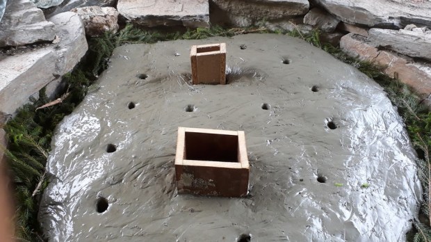 …covering with coarse clay.