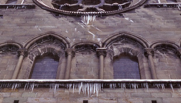 Icicles from string cources: A form of ice very normal at historic buildings. South transept, Nidaros Cathedral, Trondheim, Norway in the 1990s. Photo by Per Storemyr