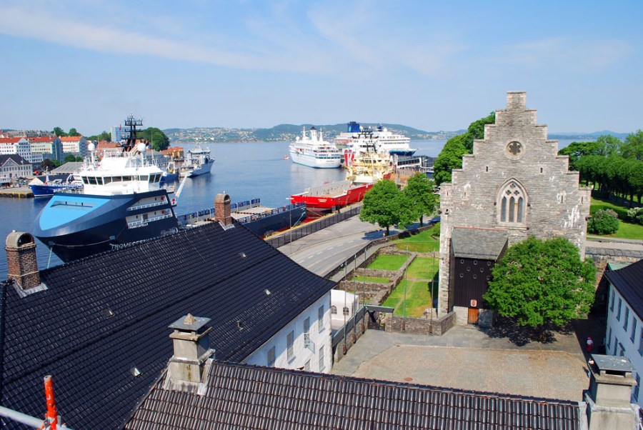 Working at the Renaissance Rosenkrantz Tower in Bergen. With a view to Bergenhus and the harbour. Photo by Per Storemyr