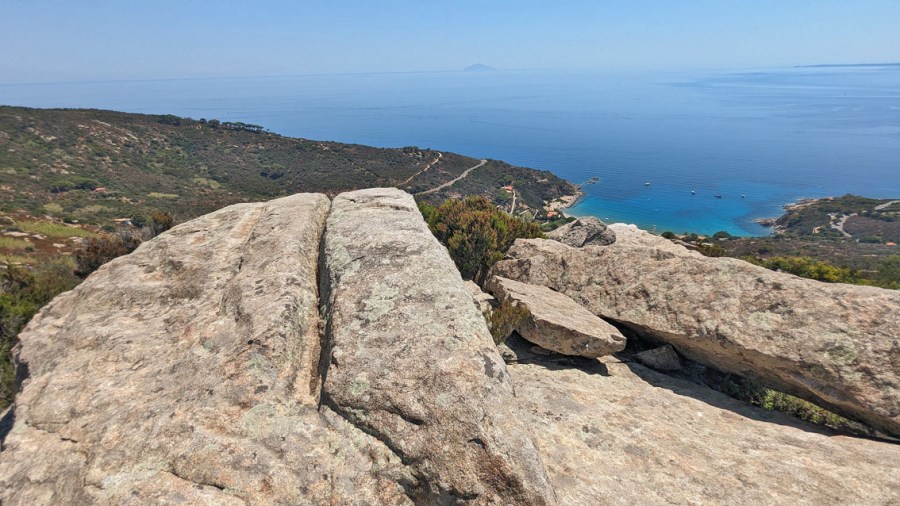 Part of the ancient quarry landscape above Cavoli, where the process of splitting column forms can be seen. Photo by Per Storemyr