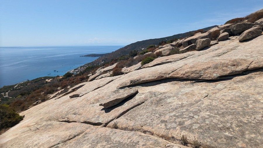 Sheeting and orthogonal cracks in the granite on the southern slopes of Monte Capanne, above Seccheto and Cavoli. Photo by Per Storemyr