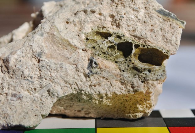 Slag in medieval lime mortar from the 11th century Hedrum church in Norway. Photo by Per Storemyr