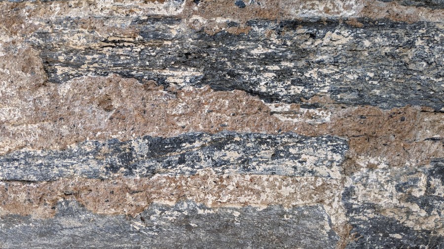 Part of the exterior, eastern chancel wall at Ulnes church, with medieval joint mortars, after removal of poor, modern plaster.